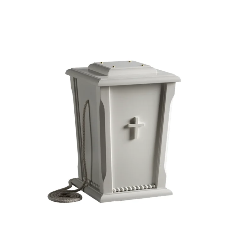 Valkoinen uurna jonka kyljessä on risti