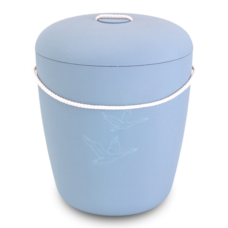 Sininen uurna jossa on joutsenet